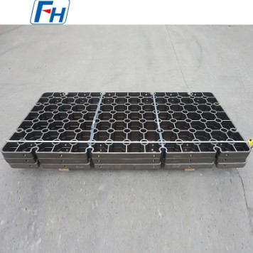 What materials are typically used to manufacture Heat Treatment Traies?